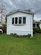 Great opportunity to own this 3 bedroom 1 bath manufactured home in Camelot Village! Conveniently located near local shopping, restaurants, schools, Metro North and so much more! Spacious open floor plan with living room, kitchen and dining area. Three bedrooms and one full bath, with an extra office or room for storage. An outdoor patio in the back for offers privacy. A nice deck entrance complete this home!  This is a great opportunity to own your own home! Lot rent includes taxes.