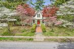 Located in the village of Cold Spring, a short walk away from the shops and restaurants of Main Street and the Metro North station, sits magical 64 Paulding, an 1890 rare, architectural gem. Tucked away on a uniquely large 1+ acre parcel with a level yard and in-ground pool, the expansive grounds, rare for a village property, create a private park-like setting adorned with mature trees, including several flowering dogwoods, Japanese maples, large rhododendrons, and azaleas. A local favorite, the charm and history of this special home is evident throughout with many treasures including original pine, wide-plank floors, two wood-burning stoves, high ceilings, decorative moldings, and a slate roof. A grand 5 bedroom, 4.5 bathroom house, with 3, 600+ square feet, the rooms are well appointed, spacious, and filled with light thanks to tall windows throughout. The layout lends itself to many configurations, including a potential in-law or nanny suite. Relax, sit back and enjoy the view from one of the porches. There are so many special spots for gathering and entertaining. This offering is unlike anything else, the potential is amazing. A walk-through will confirm the opportunity that awaits the next owner.