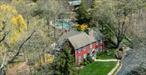 Arrive through a tree-lined drive to discover a hidden gem of stone walls, terraced landscapes, vibrant perennial gardens, serene vernal ponds, long views, and sweeping meadows â€”wrapped by the forever-protected 47-acre Thalheim Preserve; this is a place of exceptional beauty.At the heart of the property â€“ first settled in 1863 â€“ stands a stunning four-bedroom, four-bathColonial home, masterfully rebuilt in 2002. Historic charm meets modern luxury with highceilings, elegant crown moldings, custom millwork, and walls of Marvin windows that floodthe home with natural light and offer panoramic views of the surrounding landscape.The first-floor primary suite is a private retreat featuring a spacious walk-in closet, twoadditional closets, a luxurious whirlpool bath, steam shower, double sinks, and customvanities. French doors lead to an expansive approximately 800 SF wraparound mahoganyand cable deck overlooking the grounds and the untouched beauty of the Thalheim Preserve.The gracious living room and cozy den are both warmed by classic fireplaces. French doorsleading to the chair-railed formal dining room with a bay window and an open-conceptkitchen provide ideal settings for entertaining. The first floor is complemented by a full guestbath with shower and a sun-lit laundry. Upstairs, a second gracious primary suite awaits, along with two additional bedrooms, a full bath, and a versatile office or playroom. A walk-upattic and a partially finished walk-out basement offer even more potential.Outside, you will find your own serene resort â€” an exquisitely renovated pool and spa complexwith a cascading waterfall, surround sound, and landscape lighting. The tennis/pickleballcourt awaits just behind the barn and adjacent to the orchard. The approximately 1, 600 SF, two-level stone and wood barn is secluded and spectacular; it is self-contained with its ownwell, septic system, electricity, and certificate of occupancy â€” ideal as a potential guesthouse, studio, or event space. Minutes from Scotts Corners, Bedford, Ward Pound Reservation, Ridgefield and New Canaan, CT. An exceptional property that must be seen to be fully appreciated.