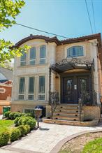 Beautifully fully renovated 2 family Brick mansion in Wakefield, Newly constructed in 2016 right next to JFK, and the conduit. This mansion has 6-bedroom, and 5 bathroom. 3 bedroom 2 baths on the first and 2nd floor, large private driveway, with garage, featuring a fully finished extra large basement with a separate entrance.