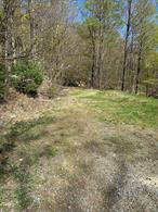Prime building lot offering over 6+ acres in Town of Deerpark, Orange County, NY. This distinctive parcel is located in the Hawkâ€™s Nest Subdivision with a location close to the Scenic Hawkâ€™s Nest. This lot has been engineered and is the perfect location to build your new dream home. The driveway entrance is off of Hawk Mountain Rd, at the end of the cul de sac, with additional road frontage on Route 97. Property offers beautiful natural stone features from turn of the century, as well as 2 quaint seasonal babbling brooks/streams, contributing to its allure. The property is in the Eldred School District (offering lower school taxes), yet still in Orange County. This property offers privacy, quiet and seclusion in picturesque Sparrowbush, NY, yet is close to Port Jervis commuter trains and buses. With it&rsquo;s close proximity to hiking trails, state land, Watershed, Upper Scenic Byway, River accesses, rafting, swimming, fishing, and not far from Bethel Woods Center for the Arts, this property holds so many opportunities for adventure & exploration. This is the perfect property to build your new home in the country. Come see this listing before it gets sold, large parcels like this in Orange County are selling fast.
