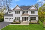 Be the first to live in this brand new classic colonial-style home with an ideal layout spanning over 7200 square feet on large level lot with room for a pool. A timeless classic in the making, this home makes a dramatic impression with an indoor-outdoor layout filled with upscale finishes including white oak flooring,  9-foot ceilings on all 3 floors, recessed lighting and custom millwork throughout. Plan your next gathering in the formal dining room, relax in the formal living room or work from home in the library with french doors. A fabulous open kitchen/family room elevates your culinary experience with custom cabinetry and state of the art appliances. A large island with waterfall edge and adjacent breakfast area provide the perfect setting for casual meals overlooking the family room with built in desk area with floating shelves and gas linear fireplace and access to the spectacular outdoor Trek deck. Past the kitchen, the mudroom offers cubbies and a rear staircase for stress-free arrivals and departures. A guest suite with a private bathroom and separate entrance completed the beautifully designed first floor. Ascend the white oak staircase to explore the home&rsquo;s luxurious accommodations, beginning with the exceptional owner&rsquo;s suite. Two walk-in closets flank the sprawling bedroom, while the owner&rsquo;s bathroom boasts a freestanding soaking tub, a walk-in shower and double vanity. Three well-appointed secondary suites with roomy closets and en suite bathrooms are joined by a large, tiled laundry room. On the flexible lower level, you&rsquo;ll find a vast recreation room, gym area as well as a sixth bedroom suite. In the rear yard, the beautiful deck welcomes al fresco dining and lounging overlooking the park like private property that can accommodate a pool surrounded by professional landscaping. Located on idyllic, low-traffic Quaker Ridge street, this beautiful home is minutes from houses of worship, country clubs, local shopping, and top-rated schools, including Quaker Ridge Elementary. Parkways are within easy reach, and both the Scarsdale and Mamaroneck Metro-North stations are just minutes away.