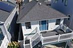 Welcome to your completely updated beach retreat in the heart of vibrant Long Beach NYThis 2- bedroom, 1 bath coastal cottage offers the perfect blend of modern comfort and seaside charm, located just a block from the Atlantic Ocean and its pristine sandy beaches.Step inside to find an open layout with newly renovated kitchen and bath, ceramic floors and stylish finishes throughout. Enjoy sun-filled mornings in your cozy living room and summer evenings on your private outdoor space-ideal for entertaining or unwinding after a day at the beach. Additional features include: Enclosed 2 Plus Car Garage ParkingUpdated mechanicals and utilities Washer/dryer Low maintenance yard. Close proximity to the boardwalk, restaurants, cafes and LIRR  Weather your looking for year-round residence, weekend getaway, or investment opportunity, this move-in ready home offers it all - Beach lifestyle with Convenience
