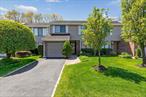 Welcome to Hidden Ponds, a beautiful gated community in Smithtown! This two-story townhouse is in diamond condition and features 3 large bedrooms, 2.5 bathrooms, hardwood floors, and plush carpeting upper level. The main level offers a welcoming entryway foyer leading to an eat-in kitchen with Italian porcelain tile flooring, custom wood cabinetry, granite countertops, under-cabinet lighting, and oiled bronze Jenn-Air appliances, including an electric cooktop. A hallway off the kitchen provides access to the attached garage, an in-unit laundry room with washer, dryer, and closet, and a convenient half bath. The open-concept living and dining room features sliding doors leading to Trex decking, overlooking a serene, park-like setting, perfect for relaxing or entertaining! Upstairs, a spacious hallway leads to two generous secondary bedrooms and a full bathroom. French doors open into the expansive primary ensuite, offering a walk-in closet and a luxurious full bathroom with glass shower doors and a soaking tub. Community Perks: Clubhouse with kitchen, movie/card room, and fitness center. Outdoor pool, tennis, pickleball, basketball, bocce ball & playground. Mailroom, extended driveway, and guest parking. Hidden Ponds offers it all â€” a perfect blend of comfort, convenience, and a lifestyle.