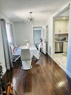 1 family home featuring 3 bedrooms, 1.5 baths, a living room, dining room, eat-in kitchen, and a full finished basement with a private driveway.