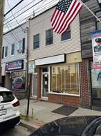 charming 2-bedroom, 1-bathroom apartment situated above a quaint storefront. Near train Station