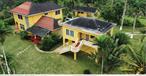 Look no further for the perfect estate home with magnificent ocean views, mountain views and just 25 minutes outside of downtown Ocho Rios and the beaches.This sprawling 14 acre gated enclave &rsquo;checks all boxes&rsquo; and is ready for it&rsquo;s new owner.This gem features imported hurricane impact windows, an Olympic size swimming pool overlooking the mountain and ocean backdrops, three stand alone buildings which comprises of the main home which boasts a fireplace, high ceilings, a sunken living room, a large galley kitchen, a laundry room, two and a half bathrooms, two very large bedrooms and two patios for endless relaxation. Every room has a pristine view.The second building is a full guest cottage with it&rsquo;s own kitchen, bathroom, bedroom and dining area with it&rsquo;s own patio to watch the sunrises, sunsets and cruise ships dock into the Ocho Rios harbor