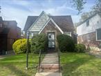 This stunning detached Tudor home in Little Neck is truly a gem! Hereâ€™s a recap of its features:Location & Curb Appeal:- Nestled on a quiet, tree-lined street in the heart of Little Neck.Interior Features:- Welcoming foyer leading to a spacious living room.- Cathedral ceiling and large oversized windows create a light-filled atmosphere.- Beautiful solid hardwood floors throughout.- Formal dining room perfect for hosting large gatherings.- Kitchen with ample cabinet space and dining area.Bedroom & Bathroom:- Spacious primary bedroom with solid hardwood floors.- Additional bedroom with views of the large backyard.- Generously sized bathroom featuring a separate shower and oversized vanity.Additional Highlights:- Fully finished basement with a separate laundry room.- Located in the highly sought-after School District 26, making it an ideal choice for families.This home combines elegance with functionality, making it perfect for both entertaining and comfortable living.
