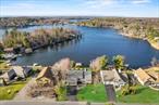 Price reduced on this ultimate lakefront getaway! Get to the lake this summer!Welcome to 149 Lake Shore Drive East, a sprawling and absolutely turn-key house situated on a third of an acre, with 92â€™ of lakefront on sparkling Lake Louise Marie. Tucked into a quiet cove on the lake, the house offers four spacious bedrooms, three and a half bathrooms, a gym/home office, and a guest room spread out between two levels with 4, 320 total square feet. Whether you are ready to host some serious parties or just want an awesome man-cave, you have it here with the custom, magazine worthy, 19â€™ fully equipped bar on the lower level. Built in 2007 with many upgrades since, this luxurious house offers central heating and cooling, recessed lighting, a 1.5 car garage, a massive deck, and an amazing multi-level waterfront yard with a dock. Your search for that once-in-a-lifetime lake house ends today, come see the best that Emerald Green has to offer!The main level features a great room with an open layout with soaring ceilings and a wall of windows and doors facing the lake. Complete with hardwood floors and a wood-burning fireplace, this will be the main gathering area for friends and family on the upper level. Until the party spills out to the massive deck that is! The deck offers excellent lake views with plenty of space for everyone to relax, sunbathe, or have a BBQ. The chefâ€™s kitchen offers granite countertops, a breakfast bar, and lots of cabinet and drawer space. The primary bedroom isnt just a bedroom, itâ€™s a massive suite. It is well over 500sf, with two walk-in closets and an en-suite bathroom. It also has direct access to the deck and lake views. There are two additional bedrooms on this level, as well as another full bathroom and a laundry room. The oversized garage can fit a large vehicle as well as having storage space for all your lake toys.The lower level is a completely finished space with tile flooring, two doors out to the backyard and an 18â€™ wall of windows facing the lake in the open family room. The fourth bedroom is located on this level, as well as a separate guest room, and another room that is currently being used as a well-equipped gym. There are two bathrooms here; the full bathroom has a large, tiled double shower with a bench, and then there is an additional half bathroom. The open family room is the highlight of the interior of the house. It is currently set up with a pool table, multiple couches and flat screen TVâ€™s, a pellet stove, and the bar, with plenty of space to spare. The bar was custom built, it has commercial grade equipment with a double sink, beverage fridge, and eight barstools. If you are lucky, maybe we will pour you a drink! *Must be 21 years of age or older, please drink responsibly.Recent upgrades include an expanded and freshly stained deck, a new pellet stove (2025), a new furnace and condenser for the central heating and cooling (2024) and a new dock (2023). The house is completely move-in ready and can be sold furnished for a truly turn-key experience.As amazing as the interior is, letâ€™s talk about the exterior. The spacious yard features multiple levels with a bluestone patio, multi-level grassy areas, a built-in bluestone firepit with a bench, a new wooden dock, and a staircase down to the lake for ease of access into the water. Lake Louise Marie is a 220-acre playground, perfect for boating, swimming, and fishing. With 92â€™ of lakefront, there is plenty of space to enjoy the lake and make memories with friends and family to last a lifetime. Emerald Green is Sullivan Countyâ€™s premier private community. It offers 2 pools and a sand beach. There are 3 lakes for boating (electric motors only) fishing and swimming. Boat slips are available for rent. There are also communal playgrounds, basketball courts, tennis courts, pickleball courts, a dog run, and an indoor clubhouse with a gym and walking track.