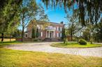 Exceptional living awaits in this stately Georgian manor house sitting on 7 acres at the top of prestigious North Quaker Hill Road. This mostly original home offers 9â€™ ceilings, radiant heating and ownership that has changed hands only once. A Belgian cobblestone driveway has a center focal point awaiting your personal touch.The Living room opens to an elegant wraparound terrace, perfect for the most formal gathering or Sunday football. The library has built in mahogany cabinetry and a full wet bar adjoins the dining room. Open airy kitchen with 12â€™ island and two of each appliance, a true chefâ€™s delight. Start your day in the cozy sunlit breakfast room where a huge bay window is host to expansive views of the lawns, French doors to the 25 x 50 pool, the perfect setting for outdoor fun and alfresco dining on a sunny day. Take the elevator, staff or main stairs up to 5 bedrooms each with its own ensuite bath, heating and cooling. The primary bedroom offers floods of sunshine, plenty of closets and is home to one of the five woodburning fireplaces.. The bonus lower level has an Italian cypress wood Game Room and entertainment room with wet bar, wine cellar and separate staff quarters. Two locker room style bathrooms complement the USTA regulation tennis court. Just an hour to NYC. Minutes to Metro North. Lower level offers an additional 2000+ sq feet of finished living space. Additional Information: Amenities:Pedestal Sink, Soaking Tub, Storage, Tennis, ParkingFeatures:3 Car Attached,