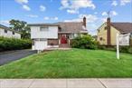 Best three-bedroom split-level home in Massapequa. This home features two full baths, a jacuzzi tub, a living room, and a dining room. Additionally, the property features a one-car garage, a three-car driveway, a huge backyard, and a pool.