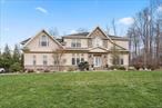 Indulge in luxury living at this resort-style residence in Chester, NY, within the prestigious Monroe Woodbury School District. Set on a tranquil cul-de-sac, this home graces one of MW Schools&rsquo; most beautiful streets. Crafted with precision by Paul Janus Building Arts, custom millwork, arched windows, and detailed moldings evoke the charm of Westchester and Bergen County homes. From the captivating bluestone entry to the newly designed outdoor kitchen, every detail exudes perfection. The spacious family room boasts a stone fireplace and bluestone mantle, while the chef&rsquo;s granite kitchen features a large island, wine rack, stainless steel appliances, and a stone backsplash. The master suite is a retreat with tray ceilings, a sitting room, walk-in closet, gas fireplace, and spa-like bath. Kids&rsquo; rooms offer ample space with double closets. The finished basement adds 1200 sq ft, showcasing reclaimed wood beams, a stone fireplace, movie theater, and gym. Step into the backyard, a vacation haven with a saltwater in-ground pool, extensive pavers, fire-pit, Koi pond, and a new three-season outdoor kitchen. Enjoy 1.1 acres of privacy in a friendly neighborhood. An excellent commuter location to NYC, Westchester, and Bergen Counties, this home seamlessly blends opulence and convenience. Welcome to a lifestyle of elegance and comfort. Lets connect and get you into your new dream home!