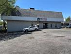 Prime Office/retail/Showroom Space for Lease â€“ 10, 800 Sq Ft + Gated Lot with Basement â€“ High Exposure â€“ Huntington StationUnlock the full potential of your business with this exceptional 10, 800 sq ft office/retail/showroom space in the heart of Huntington Station. Ideal for logistics, retail, wholesale, or creative industrial use, this high-clearance space offers unparalleled visibility and accessibility on busy Depot Road, just 1 mile from both Jericho Turnpike (Rt. 25) and the Huntington LIRR Station.Property Features: 7, 500 sq ft of versatile interior space,  20&rsquo; high ceilings â€“ perfect for storage or impressive displays, Drive-in loading dock for easy deliveries, Mezzanine level for office or extra storage, 36 parking spaces, 6, 970 sq ft gated lot included â€“ ideal for fleet parking, equipment storage, or outdoor operations, suitable for a wide range of commercial usesModern upgrades: All new LED lighting, skylights, 3-phase power, and Central A/CLocation Highlights: Surrounded by top national brands: Starbucks, Target, Home Depot, BMW, Chick-fil-A, and more, Close proximity to major roadways and public transportationIdeal For: Distributors, Showrooms, Creative/production spaces, Auto-related businesses, Retail/wholesale outlets