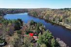 This vintage Smallwood Lake cabin has been lovingly owned by the same family for over 60years. Upon entering you are immediately drawn in to the wide-open and expansive interior withsweeping lake views. Built in the 1930&rsquo;s this grand lakefront abode would have been considereda luxurious cottage back in the day. The over sized stone fireplace, primary bedroom with fullbath and three closets, stonework, multiple porches and storage space were not typically foundin the homes built in this hamlet at that time. Many of the classic features remain untouched andthere is original woodwork throughout the home, vaulted ceilings in the living room and a largewalk-up attic, which could be finished. Venturing down to the lakeside you will be amazed at theexquisite stonework, reminding you that this is no ordinary place. Off the kitchen there is anadditional room with an abundance of windows taking in the views and natural light. Enclosedfront and rear porches, patios, dock on the lake, 2 sheds and a horseshoe drive are all a littleicing on top of this sweet place. Needs some TLC, the heating system has not been used for 30years. Smallwood Civic Association offers beach, tennis, and playground for a nominal fee. Jointhe Club at Smallwood for heated pool, clubhouse and daily/nightly activities. Minutes to hikingtrails, waterfalls, dog park, Bethel Woods Center for the Arts, motor boat lakes, and lakesiderestaurants. Launch your kayak from the shore, Watch the Bald Eagles soar, Blue Herons fish, turtles basking in the sun on the rocks, and the waterfowl play - every day! This is an amazingspecial place, ready to take on the next chapter with your family and friends and make manylasting memories.