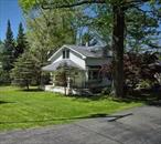 Welcome to this charming 2 bedroom, 2 bathroom home nestled on 5 acres of serene property, great for outdoor activities like hunting, cross country skiing, snowmobile, and quad riding. The highlight of the property is the impressive 5-bay, two level garage built in 1985 with a separate electric meter from the house, running water and wood stove in lower level. The garage is perfect for car enthusiasts or those in need of extra storage space for all of your outdoor toys.  The house boasts an upper level with bedrooms that are spacious and a updated full bathroom. Main floor includes the eat in kitchen, living room with a wood stove, a large bathroom with laundry area, and a mud room perfect for all of your hunting gear, boots, shoes, jackets, etc. The property offers a peaceful full time living or a part time retreat, conveniently located to the center of the town and minutes to the NY/Pennsylvania state line. Do not miss the opportunity to make this gem your own with some updating.