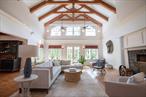 This wonderful country retreat is a balance of modern design, a wellness mindset, and timeless craftsmanship with every attention to detail. Milling trees from the property to construct the barn using the masterful post-and-beam construction method, creating intricate joints without nails.The current owner has meticulously updated the home in Union Vale which offers notably lower school taxes, adding to the appeal of this exceptional property.&#160; The first floor boasts a light-filled, two-story foyer, leading into a great room with soaring beamed ceilings, a gathering room with illuminated coffered ceilings, and a gourmet kitchen with a spacious walk-in pantry. The first-floor primary suite offers a luxurious bathroom and private terrace, while a cozy library with custom bookshelves provides a quiet retreat.Upstairs, an open landing leads to two en-suite bedrooms, each with private decks, plus an expansive bedroom currently being used as a recreational room, with dual access from the second floor or the newly built insulated mudroom. The newly finished basement has a wonderful gym.Outdoor amenities abound: the newly installed 20 x 50 heated saltwater gunite pool is designed with a gentle slope from an easy-entry 3.5-feet section to an 8+ feet deep, diveable end. The pool is fitted with an automatic cover. Nearby, an 8-person hot tub with infrared lighting above for warmth, also a rustic 6-person barrel sauna overlooking the pond and cleared land.There are newly planted cherry blossom trees spanning a .25-mile road, ideal for running or strolls, along with over 2, 000 flower bulbs throughout the property and six raised garden beds, producing ample fresh produce for a single family.&#160; The main home also includes an oversized insulated and newly finished shed, The Adirondack-style barn has been fully transformed into an insulated, year-round living space. Now adding to the propertyâ€™s total livable area of over 9, 000 square feet, the 3, 500-square-foot barn includes a rock climbing wall, split-unit HVAC for both heating and cooling comfort, and a gold pea-pebbled recreation area just behind it, perfect for gatherings. Multiple bluestone terraces throughout the property provide versatile spaces for relaxation and socializing, while three oversized fire pits add ambiance and warmth for evening gatherings. A 1, 000-square-foot platform with a permanent tent, used for family camping and cozy hunting grounds, is nestled in the woods, creating a unique retreat experience on this nearly 10-acre estate.Additional features include a geothermal heating system, radiant heat, a heated garage, a new copper gutter system, and updated roofs on both the main house and barn, making this home turnkey. The propane system efficiently supports the water heater, gas range, and serves as a backup heating system for the brand-new boiler in the barn, adding resilience and convenience. The property is equipped with electric outlets for RV or electric vehicle charging and sits just six minutes from Millbrook Village, six minutes from the Links Golf Club, one hour from Catamount Ski Mountain, and 1.5 hours from Manhattan. Close to James Baird State Park, hiking trails, lakes, and various golf courses, this Union Vale property combines modern luxury and rural charm, offering an exceptional lifestyle in a private, wellness-focused setting.This is a one-of-a-kind residence, where timeless elegance meets tasteful design.