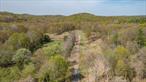 Attention Developers and Builders:Welcome to The Preserve at Lakes Kill â€“ A Rare and Remarkable Hudson Valley OpportunityNestled in the heart of Red Hook, NY, just off the scenic and sought-after Feller Newmark Road, The Preserve at Lakes Kill offers a unique, turn-key residential cluster development spanning 100 pristine acres. This thoughtfully planned enclave consists of 14 land parcels, including 11 approved building lots, each ranging from approximately a half acre to just over an acre, with private access roads and generous setbacks ensuring peace and privacy.What sets The Preserve apart is its extraordinary commitment to conservation and natural beauty. Of the 100-acre parcel, a remarkable 89 acres are protected under a conservation easement held by the respected Winnakee Land Trust. This expansive preserve forms a permanent natural buffer and offers homeowners direct access to tranquil woodlands, winding walking trails, and the serene banks of Lakes Kill, a trout-rich stream that flows into the Saw Kill. Whether you&rsquo;re an avid hiker, birdwatcher, or simply crave the soothing sounds of nature, this sanctuary offers a lifestyle immersed in the outdoors.This project comes with full approvals in place, including a state-of-the-art community septic system, designed to serve the homes collectively and to be managed by the Dutchess County Water and Wastewater Authority after the development is completed. Additional infrastructure is already underway: a private road has been roughed in from Feller Newmark Road through the site, stormwater management systems are in placeâ€”including a designated retention areaâ€”and underground electric service has been brought to the first lot. The building envelope has been selectively cleared and partially graded, nearly ready for construction to begin.Residents of The Preserve will also be part of a homeowners association that will own and maintain both the conservation land and private roads, ensuring long-term stewardship and shared enjoyment of the communityâ€™s most valuable assets.Conveniently located in the Red Hook Central School District, The Preserve offers the best of both town and country living. You&rsquo;re just 5 minutes to the charming village of Red Hook, 10 minutes to Rhinebeck, and only 5 minutes to the Taconic State Parkwayâ€”providing easy access to parks, golf courses, shopping, fine dining, farmersâ€™ markets, and cultural attractions throughout the Hudson Valley.This is more than a developmentâ€”it&rsquo;s a fully entitled, infrastructure-ready opportunity for builders and developers to create a distinctive residential community, surrounded by conserved natural beauty, in one of the Hudson Valleyâ€™s most desirable locations.