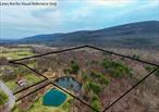 Finally available, this extraordinary 40.3-acre property offers a rare opportunity to own a piece of pristine natural beauty that has been cherished by the same family for generations. Tucked away in privacy, this land boasts sweeping mountain views, tranquil ponds, and the gentle flow of Sandburg Creek meandering through the rear of the propertyâ€”creating a serene, picture-perfect setting. Whether you&rsquo;re envisioning a private retreat surrounded by nature or exploring the possible potential for subdivision (with current 5-acre zoning), many different possibilities with multiple ideal building sites to choose from out of the flood zone, each offering breathtaking vistas. Create your own family compound. This is a truly special place to bring your dream homeâ€”or homesâ€”to life.