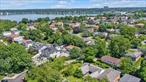 PRICE To SALE  $1, 768, 000. â€“ CORNER 100 X 106 IRR. Amazing listing in Bay Terrace! One of a kind corner unit 100x106 IRR located a block away from The Bay Terrace Shopping Center. Close to all Transportation including express bus to Manhattan and Long Island Railroad. Currently this home is 2, 448 square feet located on an 8, 215 sq. ft lot. It has a lovely Terrace in the front and a large Terrace suitable for entertaining off the back. The side yard is tremendous and there&rsquo;s a large backyard as well. The lot area is 8215 square feet which leaves 5, 751 square feet to use in many ways.This home can easily be updated with minor renovations. There is plenty of yard space to add a fabulous pool or go through the wall and extend the home to suit your needs.If a new dwelling is preferred this lot holds many possibilities. As per Architect there is also an opportunity to add an Ancillary Dwelling Unit (ADU, secondary residence) with its own driveway and private entrance.The ADU can serve as a guest house, personal office, rental unit, or space for multi-generational living. The large size of the main house allows for flexible floor plans and the potential for multiple bedrooms, large living areas and luxurious amenities. The new residence may be 5, 229 square feet with a 300 ft garage or a 4929 square foot home with an ADU. It can be expanded as a single floor home or a second-floor addition is permitted, offering ample space for the main residence and additional living space which can be used for various purposes. The large size of the main house allows for flexible floor plans and the potential for multiple bedrooms, large living areas and luxurious amenities. This is a corner lot which offers privacy and space. A rare find.