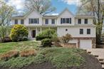 ULTIMATE MOTHER DAUGHTER WITH TWO LARGE KITCHENS.......This one-of-a-kind 7/8-bedroom colonial is absolutely resplendent with style and grace, like something out of a magazine. Every inch of this expansive, beautifully maintained colonial exudes the perfect blend of luxury, comfort, and versatility in a quiet, tree-lined neighborhood near the local elementary school. CLARKSTOWN SCHOOLS. The in-home elevator offers direct access from the garage to the in-law suite to the top floor. When entering the house through the two-car garage there is over 1, 000 square feet of finished basement area/storage, the well-appointed mudroom leads to the rec room. Upstairs the attractive kitchen features KraftMaid cabinetry, granite countertops, a center island, and stainless-steel appliances. Detailed crown and picture-frame moldings, adds architectural charm throughout. The family room boasts hardwood floors and a wood-burning fireplace, while the office has custom woodwork along with hardwood floors. Off the main kitchen is the in-law suite, accessed via elevator, separate deck, or through the main level, with an additional full-size kitchen, master bedroom/walk-in closet, and en suite bathroom. With 7/8 bedrooms and plenty of closets, plus 4.5 bathrooms, this house is fraught with comfort and convenience and provides for multigenerational/extended family living situations. Step outside to enjoy gatherings on the TimberTech deck overlooking the heated 16&rsquo;x33&rsquo; inground pool (built 2006) surrounded by elegant paver stones, all set within a fully fenced and extensively landscaped park-like yard, complete with a spacious shed. Relax year-round on the mahogany front porch. This home is inclusive of an 80-gallon water heater.  The roof on the original house was installed in 2005 and the addition in 2010. Other amenities include a Culligan water softener system (2022), 3-Zone Air Conditioning, 7-Zone gas baseboard heat, a 22KW whole-house gas generator, and a Humidex ventilation system for optimal basement air quality. This home offers the rare combination of elegant design, smart upgrades, and a tranquil neighborhood surrounded by natureâ€”ideal for comfortable everyday living.