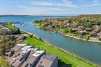 This is the one you have been waiting for! This renovated Abbott end unit checks off all the boxes. Step into your own 6000 square foot waterfront paradise and embrace the beauty of coastal living! This home has had many updates including, new boiler, new AC units, new bathrooms including dual primary ensuite, new kitchen, new deck and more! This boaterâ€™s dream home offers boat slips at a private marina just outside your back door, making every day an invitation to set sail. Wake up to breathtaking views of Northport Bay and beyond, and enjoy a front-row seat to the spectacular July 4th fireworks. Nestled in the heart of Northport Village in this prestigious gated community, youâ€™ll have access to a heated gunite pool, clubhouse, tennis/pickleball courts, and 62 acres of picturesque waterfront grounds to explore. Just moments from pristine beaches, scenic golf courses, lush parks, charming shops, vibrant theater, and top-rated restaurants, this is more than a homeâ€”itâ€™s a lifestyle. Indulge in the elegance, serenity, and adventure you deserve!