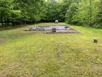 Clear 0.30 acre lot with drilled well, septic and foundation. Extensive amount of paperwork issued by township. All paperwork will be given at time of transfer of title. Lot backs up to stream. Ideal location.