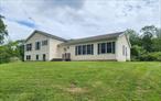 Here is a great opportunity to acquire a beautiful split-level home, on 2 acres of land. This property is well maintained and was built in 2003. Within the home you are welcomed to the living room which is well lit and expands into the dining area with access to the back deck. The kitchen offers great cabinet and countertop space. The first floor also features a half bath, and laundry hookup access. On the second floor you have a den/office space, along with 1 primary bedroom with the primary bathroom, you also have 2 well sized bedrooms and 1 regular sized bathroom (totaling 1 den, 3 bedrooms, and 2 bathrooms). On the basement level you have access to a large storage space or additional space to use as you desire, you also have direct access to the 2-car attached garage. The garage is well kept and offers additional storage space if needed. Located in Esopus NY, you are conveniently located off the main road of Route 9W, providing quick access to surrounding towns of Kingston, Rosendale, Highland, New Paltz, Marlboro, and Poughkeepsie. This home provides an excellent price value for any buyer! Take advantage of this deal by making this home yours today!