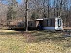 Minutes to the Pepacton reservoir and tucked in the valley of Shaver Hollow, this mobile home is a perfect starter home or weekend getaway. The area is quiet yet accessible and all the nature and forest that make Delaware County special are right in the back yard. Would also make a great rental. Thousands of acres of city and state land are just a short distance away. LOW TAXES!This is a great opportunity to own some real estate without breaking the bank. Schedule your tour today.