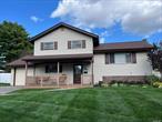 Beautifully maintained split level home features three levels of living space. Enter first floor to a bedroom and den with 1/2 bath and sliding doors leading out to the patio and fully fenced in backyard with shed. Second level has west facing light into the living room and dining area. Kitchen offers plenty of cabinet space, gas stove, granite island and stainless steel appliances. Sliding glass doors opens to a private composite deck, large enough to become the summer outdoor living space,  facing the superbly manicured lawn. Third level has recently remodeled bathroom, primary bedroom plus two additional bedrooms. Oak flooring through most of the home. Move right in. Backyard offers space for IGP. Close to shopping and railroad., Additional information: Appearance:Excellent, Separate Hot water Heater: Gas heat