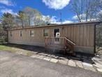Escape to your own private paradise with this charming mobile home nestled on over 10 acres in Delancey, NY. Perfect for hunting and fishing enthusiasts, this 2-bedroom, 1-bath retreat offers a cozy 700 sqft of living space and backs up to a serene body of water that flows into the Pepacton Reservoir. Enjoy the natural beauty and tranquility of your surroundings as you relax on your deck overlooking your stunning property, listening to the sounds of nature and taking in the fresh mountain air.With plenty of room to explore, this property is an outdoor lover&rsquo;s dream. Ideally located near hiking trails and recreational activities, youâ€™re just minutes away from the best of upstate New Yorkâ€™s wilderness. Experience the perfect blend of comfort and adventure in this one-of-a-kind getawayâ€”your dream retreat awaits! Donâ€™t miss the chance to own this slice of heaven!