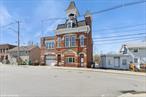 A Once-in-a-Lifetime Opportunity: Own a Historic Victorian Firehouse in the Heart of BeaconPresenting a truly exceptional offering: a one-of-a-kind, second empire, Victorian firehouse nestled in the vibrant heart of Beacon, just steps from the lively restaurants and activity of the east end of Main Street. Built in 1889, this stunning brick architectural landmark is rich in original detail and character, a testament to Beacon&rsquo;s storied past.Rising two and a half stories on the street side, the firehouse is distinguished by its striking mansard roof, original bell tower (adapted for a siren), and a second tower, once essential for drying hoses. The facade is a masterpiece of fine brickwork, adorned with a bracketed and dentillated cornice and the original, proudly displayed â€œBeaconâ€ lettering.The street-level first story features a meeting room, offices, and a lavatory, alongside an apparatus bay added in 1924 on the east side. Ascend to the second story and discover a dramatic and grand gathering room illuminated by beautiful arched windows. The room&rsquo;s focal point is an original plaster medallion on the ceiling, uniquely designed with a firehouse motif. The east side of this level offers picturesque views of Mount Beacon and includes a spacious, mess hall-style kitchen, once the hub for community events.The third half-story reveals the building&rsquo;s robust interior construction with original, massive wood beams, previously utilized for storage. From here, access the roof and be rewarded with breathtaking panoramic vistas: the majestic Mount Beacon to the east, and the charming rooftops and Fishkill Creek to the south.Below the first story lies an unexpected and inviting clubhouse area. This space boasts a handsome oak bar, a brick and stone mechanical room which could also make an amazing wine cellar, and a pool table game room. Step outside to a surprisingly large deck, enveloped by trees, offering a magical and private setting for gatherings and entertaining.Keep warm with heat provided by a gas fired Hydrotherm boiler. The building has a 40 gallon American Standard hot water heater, 200 amp electrical service, back up generator, and central AC in the basement.Zoned R1 single family, this remarkable property also benefits from its location within the Historical Overlay District and its prestigious listing on the National Historic Registry. This unique combination unlocks an exciting array of adaptive reuse possibilities. Permitted uses include single-family residency, or with a special use permit: a boutique hotel with accessory services, a distinguished social club, a restaurant accommodating up to 50 seats, professional offices for up to 10 employees, multi-unit dwellings (up to 4), an inspiring art studio, and more. (See attached document for a complete list of potential uses.) Additionally, the City of Beacon maintains a camera on the roof, which will remain in use.Please see attachments for more information.Don&rsquo;t miss this extraordinary chance to own a significant piece of Beacon&rsquo;s heritage and reimagine its future.
