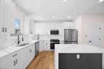 Space, style & modern luxury come together at 3022 Avenue I. A meticulously renovated, turn key move in ready single family, with parking nestled on a beautiful tree lined street of Midwood.Open the door and enter an expansive sun drenched, modern open concept living/dining area which provides great space for stainless steel appliances. The elegant chefs granite kitchen is tucked away towards the rear of the property. Kitchen features floor to ceiling custom cabinetry, adorned with a full fleet of stainless steel appliances, double sink, island for bar stool seating and leads out into lush rear yard. Powder room on first floor for your guest.Up a flight of stairs onto the second floor 3 spacious bedrooms awaits you, each equipped with ample closet space. The primary suite is equipped with a private en suite that boast spa-like finishes. Down the hall an additional fully tiled bathroom is shared between the two additional bedrooms. The high ceiling full finished basement can be used as the perfect in-law suite, media den, storage space or additional recreational space. Renovations include brand new select wide oak wood flooring, recessed lighting, energy saving Split unit systems, brand new electrical, heating and plumbing systems throughout. Conveniently located with close proximity to major transportation which makes commuting a breeze. Just off Nostrand Avenue, Flatbush Avenue, Avenue J, Avenue K. Short blocks to schools, shopping centers, restaurants, cafes, parks and many other vibrant neighborhood amenities.