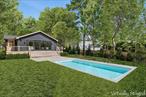 East Hampton Living at Its BestLocated just minutes from East Hampton Village and the iconic Round Swamp Farm, this beautiful four-bedroom, three-bath home offers the perfect blend of comfort, style, and convenience.Set on a quiet cul-de-sac and surrounded by nature, the home features a welcoming covered front porch, a back deck perfect for summer gatherings, and an in-ground heated saltwater poolâ€”ideal for making the most of the season.Inside, youâ€™ll find 1, 950 square feet of thoughtfully designed living space, including a finished lower level with a walkout, a versatile office/laundry room, and a convenient mudroom. The primary bedroom offers a private en-suite retreat, while built-in speakers and Ring security cameras add modern touches for effortless living.Perfectly situated near both bay and ocean beaches, this home is an ideal year-round retreatâ€”or an incredible investment opportunity as a summer rental.Donâ€™t miss your chance to experience the very best of East Hampton living!
