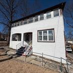 Legal 3 family unit plus a full unfinished walk-out basement level now available in Central New Rochelle! --3 Bed/1 Bath, --3 Bed/1 Bath, --1 Bed/1 Bath plus walk-out basement. This home has been updated with brand new electrical and plumbing, Brand new central split units throughout. 4 separate meters for each level. Each unit will pay their own utilities. Heat & Cooling is on electric. 3 gas meters for cooking only. Majority of the house was renovated and is almost finished and will be sold strictly AS-IS with a recently opened permit. Minor finishing to be done on interior and exterior. Cash or Renovation Loan only! Interior photos are virtually staged. Excellent investment opportunity! Contact your agent for a showing today!