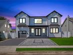 Under construction with time to customize, this brand-new home in the heart of Levittown offers a rare opportunity to personalize a luxurious 5-bedroom, 4.5-bath residence on a spacious 60x100 lot. Designed with comfort and style in mind, it will feature a main-floor en suite, a modern two-tone designer kitchen with quartz backsplash, a formal living room, family room, dining room with wet bar, grand double-height entryway, walk-out basement, and a 1-car garage. Conveniently located near shopping, dining, and major roads, this home is truly one of a kindâ€”photos shown are of the builderâ€™s previous work to showcase quality and design.
