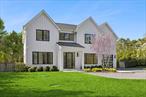 Just finished and introducing this magnificently sleek and sunny transitional country home that is abounding with modern flair. Boasting over 5, 300 sq. ft. on three levels, set in a serene and private enclave that&rsquo;s enveloped by a 30 acre private nature preserve with beautiful hiking trials that were gifted to residents by the Shinnecock Golf Course. This exceptional property is ideally located south of four world-class renowned Golf Courses and is very close to the tranquil Shinnecock Bay, and the magical Noyac bay beach by the National Golf Links and the Sebonack Golf Club. Residents will enjoy direct access to the natural 26-acre preserve featuring a rare grassland hiking trail right at their doorstep, along with super convenient access to the golf courses, the Southampton village, restaurants, marinas, and pristine beaches, all just minutes away by car. The area feels very much like Montauk but without the long drive from Southampton. Furthermore, it offers a magical ambiance, making it the perfect backdrop for your new home. As you enter the house, you are greeted by a grand double-height foyer and a striking butcher block floating staircase illuminated by ambient and natural light. This residence features 7 luxurious en-suite bedrooms and 2 half bathrooms and and even a dog bath, ensuring ample space and privacy for family, guests, and pets. The chefâ€™s kitchen is equipped with a six-burner Wolf range, Gaggenau refrigerator, wine cooler, and a stunning waterfall quartz countertop, all designed for both comfort and elegance. Enjoy cozy evenings by the fireplace or unwind in the fully finished lower level, complete with a gym, sauna, and a spacious recreational area. Step outside to your own private oasis, featuring a heated gunite pool surrounded by meticulously designed landscaping that includes the planting of mature green giant trees. This lush greenery provides privacy and enhances the natural beauty of the property. This home is thoughtfully customized to include a Sonos sound system throughout, allowing for seamless audio enjoyment. Additionally, the elegant trim, typically found in more expensive homes, adds a touch of city sophistication. Beautiful wood floors grace every level, enhancing the warmth and charm of the space. The innovative architecture maximizes open living spaces with high ceilings and a well-planned floor layout, creating an inviting atmosphere throughout. This centrally located neighborhood has become a sought-after destination, with over seven new luxury builds making this home a fantastic value. It&rsquo;s easy access from New York City, proximity to Southampton Village, multiple marinas, four world-famous golf courses, vineyards, and the pristine beaches of Southampton make it an ideal location for savvy buyers. Additionally, the neighborhood caters to outdoor enthusiasts, offering special interest opportunities for hiking, biking, boating, and enjoying marine life. Residents can take advantage of the trails within the incredible nature preserve right across from the property and the direct access to marinas via bike or ebike path to the South Montauk Highway. This home represents exceptional value for personal use and offers significant investment potential, given its prime location near numerous Southampton attractions, including The Shinnecock and Sebonic Golf Courses, vineyards, marinas, beaches, and fine dining. It can conservatively rent for $185, 000 for the summer season and likely $70, 000 to professional golfers in need of proximate luxury accommodations while the US Open is being played at The Shinnecock Golf Course. With an impressive array of amenities and an extensive premium landscaping package, this home is attractively priced and presents a unique opportunity for buyers seeking unparalleled value. Contact us today to schedule a tour of this spectacular new home offering an extraordinary lifestyle surrounded by the absolute best that Southampton has to offer.