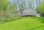 Off a pretty country road is this 2 to 3 Bedroom, Ranch style Home. Features include large Living Room with plenty of room to spread out, updated Kitchen and Main Bedroom has private tiled bath with deep soaking tub, 2 additional Bedrooms (3rd Bedroom converted to laundry but can be easily changed back or used as office plus 2nd guest full Bath. Full Basement has potential for future growth. whole house generator included gives extra comfort on stormy days. Set on 1 private easily maintained acre with lovely trees and peace and quiet. This perfect started or retirement home is conveniently located within minutes to schools, parks and Village of Red Hook.