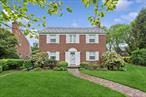 Welcome to 94 Stratford Ave, a classic brick Center Hall Colonial set on a beautifully landscaped 80 x 110 corner lot in Garden Cityâ€™s coveted Estates Section. This 2, 286-square-foot home features a timeless slate roof, four spacious bedrooms upstairs (including a main ensuite), 2.5 bathrooms, a generous living room with fireplace, formal dining area, and a bright eat-in kitchen filled with natural light. Additional highlights include hardwood floors throughout, a two-car garage, and a large walk-up unfinished attic offering endless potential. Conveniently located near top-rated schools, parks, shopping, dining, and the LIRR for an easy commute.Designed in 1928 by Olive Tjaden-one of New Yorkâ€™s pioneering women architects, who created more than 400 homes in Garden City-this residence is a rare opportunity to own a piece of architectural history.