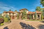 Welcome to this stunning custom-built Mediterranean home, where luxury meets comfort in a unique and stylish way. This spacious home boasts seven bedrooms and five bathrooms, offering ample space for your family and guests. As you enter, you&rsquo;ll be greeted by the soaring ceilings that create a grand sense of space and elegance throughout the home. The chef&rsquo;s kitchen is a true masterpiece, featuring top-of-the-line appliances, custom cabinets, and granite countertops, providing the perfect space to prepare gourmet meals and entertain in style. The kitchen flows seamlessly into the dining and living areas, making it easy to host large gatherings or enjoy quality time with loved ones. The large master suite is a true oasis, complete with a spa-like bathroom, dual vanities, and a spacious walk-in closet. You&rsquo;ll love waking up each morning to the natural light and breathtaking views from your windows. The home also features a three-car garage, offering ample space for your vehicles and additional storage. As you step outside, you&rsquo;ll discover the beautifully landscaped backyard, complete with a sparkling swimming pool and plenty of space for outdoor entertaining. This home is perfect for those who value quality craftsmanship and attention to detail, with every aspect of the design carefully considered to ensure comfort and luxury. Don&rsquo;t miss this opportunity to make this Mediterranean dream home yours., Additional information: Appearance:Mint, Separate Hotwater Heater:Yes