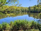 Attention Investors! You&rsquo;ve found the perfect investment for those looking to capitalize on this properties Resort Residential Zoning. Enjoy panoramic views of Lake Marion. This 1.5 acre (approx.) property is a short walk to a community beach with views of Peconic Bay. There are nine rental units on the property as follows:Six 2 brs. Three of which have 1 bth, three have 2 bth.Three 1 brs.All have kitchens which include an electric or gas range. All are heated and have air conditioners.