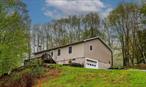 Welcome to this well-maintained 3-bedroom, 2.5-bath home located on a quiet dead-end road in the picturesque town of Neversink. Set against the backdrop of the Catskill Mountains, this property offers a peaceful setting with an open-concept layout ideal for everyday living and entertaining.The living room features a cozy wood-burning fireplace and expansive windows that fill the space with natural light while framing beautiful mountain views. The kitchen flows easily into the dining area, providing a comfortable space for meals and gatherings. Step outside onto the deck to enjoy the surrounding nature and fresh mountain air.The home includes convenient main-floor laundry and a whole-house generator for added peace of mind. A one-car attached garage and separate two-car detached garage offer plenty of parking and storage space.Located just minutes from the Rondout Reservoir, outdoor recreation is easily accessible, including hiking, fishing, and more. Whether you&rsquo;re seeking a full-time home or seasonal getaway, this property offers a comfortable lifestyle in a serene Catskills setting.For more information or to schedule a showing, contact Lisa Amato at 845-978-8168