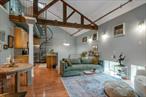 Experience the perfect blend of historic charm and modern comfort in this sun-drenched 2 bed, 2.5 bath condo located in a beautifully converted antique schoolhouse. This distinctive residence pairs original architectural character with contemporary finishes. Soaring vaulted ceilings with exposed beams and oversized windows flood the space with natural light, enhancing the open, airy ambiance. The primary suite offers a serene retreat with a luxurious whirlpool tub, perfect for unwinding. Hardwood floors throughout add warmth and texture, while the loft area provides flexible additional living spaceâ€”ideal for a home office or den. Building amenities include elevator access, two assigned parking spots, and secure bike storageâ€”perfect for weekend excursions along the scenic Old Croton Aqueduct Trail or around town. Located just steps from charming shops, top-rated dining, a vibrant weekend farmers market, and convenient transportation, this exceptional home is perfect for those seeking character, comfort, and walkable convenience. (Assessment fee of $174.40 until 9/29)
