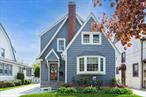 Just Turn the Key! This Stunning Tudor, in the Incorporated Village of Floral Park, is waiting for its New Owner!! Completely Renovated in 2022, Renovations Include, New Simonton Windows (All Windows Have Top-Down & Bottom-Up Shades), 6 Fujitsu Split Unit AC. New Architectural Roof, New Siding, New Driveway, Bluestone Stoop and New Garage Door. Even An Electric Car Outlet in Driveway.As You Walk Thru the Front Door, enter into a Beautiful Living Room with a Wood Burning Fireplace, French Doors to the Family Room, Large Formal Dining Room with Sliding Doors to Brick Patio and Yard. Gorgeous Eat-in-Kitchen with Beautiful White Cabinets and Quart Countertops, a Sub-Zero Refrigerator, Bertazzoni 4 Burner Stove, with Ceramic Floor Tiles. Living Room and Formal Dining Room Have Tin Ceilings to Fit in with the Old-World Charm Throughout. In the Middle of the Home There is a Lovely Staircase Which Leads to a Large Master Bedroom, 2nd Bedroom with a Nursery, 3rd Bedroom, and Huge Bathroom with a Jacuzzi and Shower. There is a Walk-up Staircase to a Large Room. The Basement Is Finished with Lots of Closet Space, Exercise Area, Office Room, Laundry Room and Full Bathroom with Shower. Additional Features Include All Wood Floors on First Floor Redone 2024, 2 Zone In-Ground Sprinkler System, Lovely Paved Patio and Timed Outlet on Front Stoop for Decorative Lights.Close To Village Park, Shops, and Restaurants. Only Blocks Away from L.I.R.R. Train Station (35 Mins. To Manhattan) Taxes Before S.T.A.R. $15, 341.89  S.T.A.R.$751.34  Total Taxes After Basic S.T.A.R. $ 14, 590.30