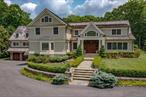 Welcome to 70 Haights Cross, a stunning turn-key 5 bedroom, 7.2 bath colonial designed by noted architect Tasos Kokoris. Located in a coveted neighborhood, this home is set on 2 plus private professionally landscaped acres with a Gunite pool with waterfall and jacuzzi. The heart of the home lies in the gourmet kitchen featuring a Wolf-6-burner range, warming and fridge drawer, 2 Bosch dishwashers and a Subzero refrigerator. Flooded with sun-light and offering all of today&rsquo;s modern amenities, this home is truly a serene oasis offering unparalleled living space and is perfect for indoor or outdoor entertaining with an oversized deck and stunning patio. There is an expansive family room with gas fireplace, a wood paneled library with wood burning stove, home office and upstairs gathering room. The lower level features a spectacular garden room leading to a patio, 2 full baths, rec room, lounge, sitting room and mudroom. This home borders Glazier Arboretum and its spectacular hiking trails for ultimate tranquility: private and serene! Experience the pinnacle of gracious living.