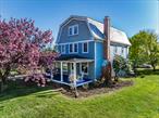 Discover timeless charm and classic North Fork living in this stately 1910 Grand Dame, gracefully sited in one of Cutchogueâ€™s desirable locations. Featuring four bedrooms and three well-proportioned floors, this distinguished home showcases a gambrel roof and period details that reflect a bygone era.Ideally situated just moments from the heart of Cutchogue village, youâ€™ll enjoy easy access to local restaurants, shops, the library, and nearby beaches. Golf courses, vineyards, and award-winning wineries are all within minutes, offering the best of North Forkâ€™s coastal lifestyle. This property backs up to the historic The Old House - 1649 property, one of the original homes on the North Fork, providing both privacy and a sense of place steeped in local history. With generous living space, classic architectural lines, and a location that balances tranquility with convenience, this rare offering is perfect as a full-time residence or cherished weekend retreat.Come make your mark on a true North Fork classic.