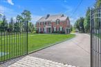 A true gem in Glen Cove, NY. This all brick colonial is situated stately behind an elegant gated entry on 1.11 acres, beautifully manicured and all flat, a really nice serene setting of sweeping lawns. The house has amazing curb appeal and presence. Once owned by the parents of Lorna Goodman, of the famed Bergdorf Goodman, the property is interwoven with much of New York City&rsquo;s culture, a testament to the refined character of this exceptional property. Inside, a combination of classic and modern architectural elements and generous proportions permeate through the residence. From gracious entertaining rooms to sunlit bedrooms, the home exudes charm, dignity, and the potential for personalization. A welcoming entrance foyer leads to the formal living room with fireplace and the open kitchen to den and office. Magical Sun Room in the rear of the house with walls of windows overlooks the lush grounds. Primary bedroom with en-suite bath and three additional bedrooms all on the second floor. A full basement and walk up attic space easy to get to round out the interior. 2-car garage and long private driveway with mature perimeter landscaping. Residents in Glen Cove enjoy access to a collection of beaches, verdant parks and a vibrant downtown, home to seasonal farmer&rsquo;s markets, boutique shopping, charming cafes and A+ restaurants. Deeply rooted in Gold Coast history on the North Shore of Long Island, Glen Cove is a coastal city with a lot to offer, including a golf course on the LI Sound. Be the next owner of this fabulous property and enjoy immediately.