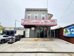 Welcome to this corner mixed use opportunity featuring a ground floor retail unit with a second floor residential unit. The property was completely renovated in 2015 with new roof, plumbing and electric and a new c/o was finalized in 2017. The first floor lease generates 5970/month starting October 2025 with 3% lease increase with lease ending September 2027 (2 years remaining). The basement of approximately 1200 sf with high ceilings is included in the ground floor lease. The second floor consist of 3 nicely proportioned rooms, renovated kitchen and bathroom with large flat roof balcony. Easy maintenance and high returns. Investors welcomed!