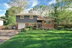 Welcome to 24 Harvard Lane, Commack â€“ a beautifully updated 3-bedroom, 1.5-bathroom split-level home in the heart of one of Long Islandâ€™s most sought-after neighborhoods and school districts.From the moment you arrive, youâ€™re greeted by a manicured front lawn, lush perennial landscaping, and a modern brick and gray-blue vinyl exterior that exudes curb appeal. The oversized driveway and attached 1-car garage offer both convenience and charm.Step inside to a bright and stylish interior with oak hardwood flooring throughout and a freshly updated color palette. The foyer opens into multiple split levels with crisp white brick walls and a stunning glass-block accent railing that fills the space with light. The spacious formal dining area flows into a beautifully updated kitchen complete with granite countertops, stainless steel appliances, a skylight, and natural gas cooking. Sliders off the eat-in kitchen open to a large deck overlooking your backyard retreat.The full bathroom has been thoughtfully renovated with sleek black fixtures, modern tilework, and an elegant vanity. Each bedroom is well-sized, with abundant natural light and ample storage.Downstairs, the cozy den offers a perfect secondary living space or playroom, while French doors lead to an enclosed sunroom with wraparound windows and dual skylightsâ€”an ideal space for relaxing or entertaining year-round with views of the entire yard.Step outside to a backyard paradiseâ€”a sparkling vinyl in-ground pool framed by pavers, multiple lounge and dining areas, a firepit with seating, and surrounded by privacy landscaping that creates a serene escape. The property is fully fenced, offering safety and seclusion for entertaining or enjoying quiet moments in nature.Conveniently located near top-rated Commack schools, shopping, parks, and major roadways, this home is the perfect blend of modern upgrades, thoughtful design, and outdoor luxury.Donâ€™t miss this oneâ€”it truly has it all. Kitchen 10 years, Dishwasher 5 years, Microwave 5 years, Whirlpool Refrigerator 1 year, CAC 1 Zone, Split System New, Anderson Windows 30 years, Roof 8 years, Boiler 8 years (Natural Gas, 1 Zone), HWH 5 years, 2 Cesspools 10 years, Sprinklers 5 Zones, 150 AMP
