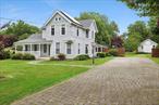 Welcome to 264 Washington Avenue in the Heart of the Village of Jamesport on the North Fork of Long Island. Originally Built in 1883. Lovingly Inhabited and Maintained Over the Years. A Very Special Home and Property. All Updated Throughout While Keeping the Old-World Charm and Detailing. Custom Built-Ins, Moldings and Wood Flooring are Mostly Original. Stained Glass Accents. The Eat-In Kitchen is Updated with White Wood Cabinetry, Black Granite Countertops, Stainless Appliances, Brand New Induction Range for Cooking. There is a Wood Burning Stove in the Mudroom with Laundry Off the Kitchen. 2 Additional Gas Fireplaces in the Family Room and Living Room. The Home Boasts 3+ Bedrooms, All Located on the Second Floor of the Home. The Primary Bedroom has a Bonus Room Currently Storage and Additional Living Space. The Second Floor Full Bath Features a Great Claw Foot Tub for Soaking. The Entire House is Geothermal. Solar Panels Service the Home for All Heating and Electric Needs. Extremely Low Energy Costs. The Roof is 5 Years Old and the Solar Panels are Approximately 10 Years Old. There is a Brand-New Oil Tank for the Back-Up Furnace to the Geothermal System. Street Gas Also Services the Home. Tankless Hot Water. Central Air Cools the Home. The Full Basement with Indoor and Exterior Access is Home to All Utilities and the Full House Generator. There is a Great Front Porch on the Home for Enjoyment at Any Time of the Day or Night. A Huge Screened in Porch on the Rear of the Home Allows for Additional Living, Lounge or Entertainment Space. The Property is .77 of an Acre with an Incredible Amount of Yard Space for a Pool and More. There are 2 Outbuildings on the Property. The Workshop Provides a Great Space for the Artist in You with Loft Above and Full Basement Below. There is a Machine Shop to the Rear of the Property with Front and Rear Double Doors for Easy Access for Large Equipment. All Just Around the Corner from Town Center Shoppes, Restaurants, Bakery, Vineyards, Farmstands and Beaches Galore. Make Jamesport Your New Home. You Will Truly Love Where You Live.