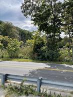 Build your dream home amongst the Gold Coast Mansions. Beautiful 5 acre lot, with spring lake, and unobstructed water views of West Harbor looking over to Centre Island. Feasibility study completed.